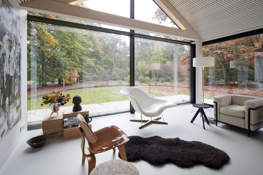 ConceptPatio 130 Hliníkové posuvné systémy, ConceptSystem 77 Hliníková okna a ConceptWall 50 Hliníkové fasády - House The Brouwhuis se nachází v Oisterwijk, Nizozemí