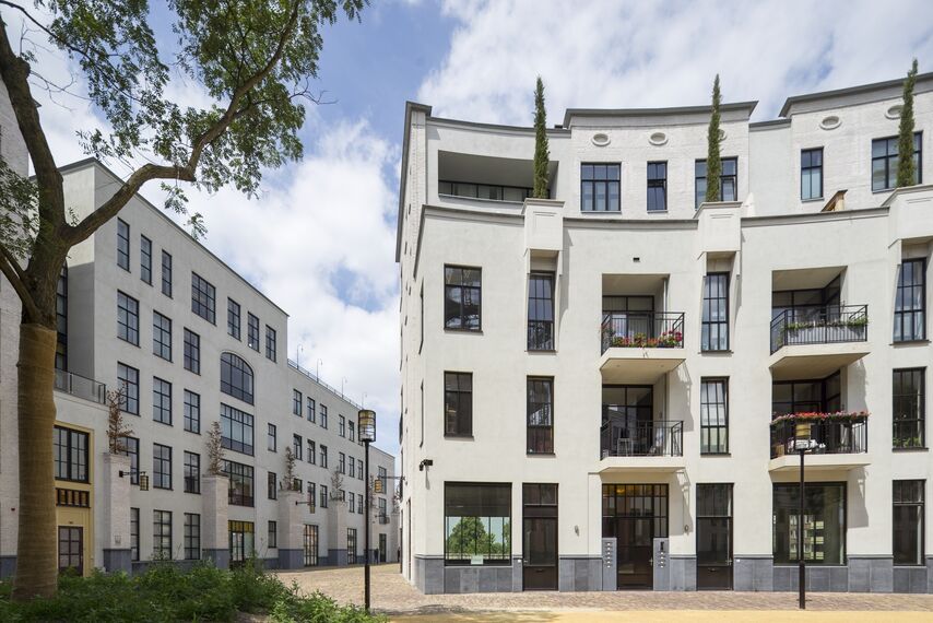SlimLine 38 Hliníková okna a ConceptWall 50 Hliníkové fasády - Maankwartier se nachází v Heerlen, Nizozemí