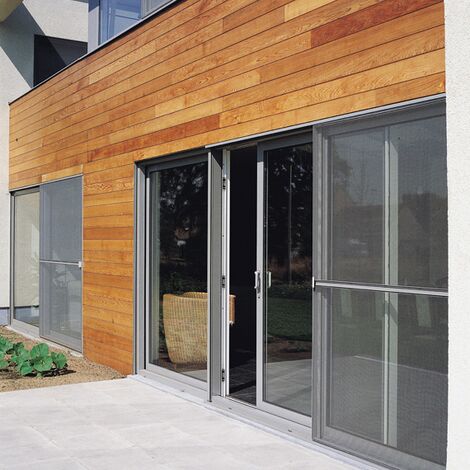 Sunny outside view of an opened Mosquito mesh screen in front of a sliding solution.