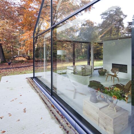 ConceptPatio 130 Hliníkové posuvné systémy, ConceptSystem 77 Hliníková okna a ConceptWall 50 Hliníkové fasády - House The Brouwhuis se nachází v Oisterwijk, Nizozemí