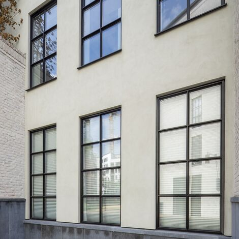 SlimLine 38 Hliníková okna a ConceptWall 50 Hliníkové fasády - Maankwartier se nachází v Heerlen, Nizozemí