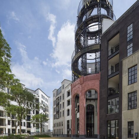 SlimLine 38 Hliníková okna a ConceptWall 50 Hliníkové fasády - Maankwartier se nachází v Heerlen, Nizozemí