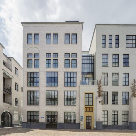 SlimLine 38 Hliníková okna a ConceptWall 50 Hliníkové fasády - Maankwartier se nachází v Heerlen, Nizozemí