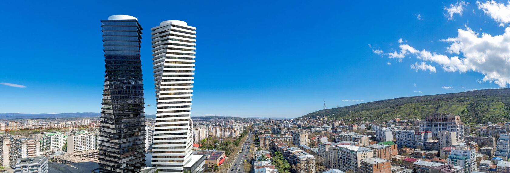 ConceptWall 50 Hliníkové fasády, ConceptSystem 77 Hliníkové dveře a ConceptSystem 77 Hliníková okna - Bytový komplex Axis Towers se nachází v Tbilisi, Gruzie